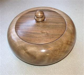 Walnut lidded bowl by Lionel Rawlins